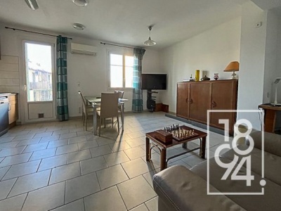 T3, traversant avec 2 balcons, cave et garage