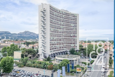 Appartement de type 3 de 65m² en 7ème étage avec terrasse de 21 m² ,ascenseur ,gardien et box double en sus